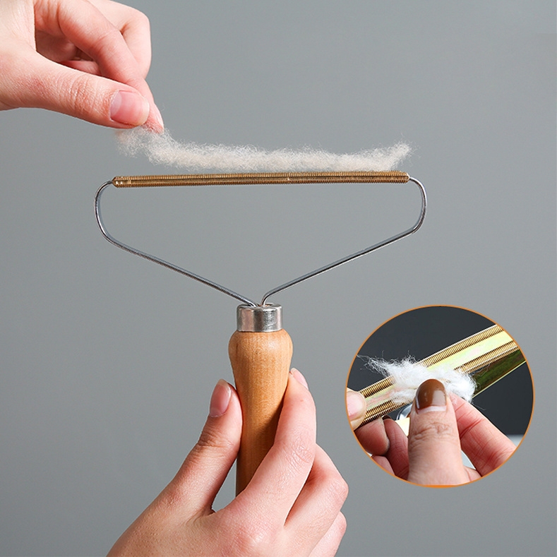 Holiaci strojček na oblečenie svetre hrebeň na chlpy